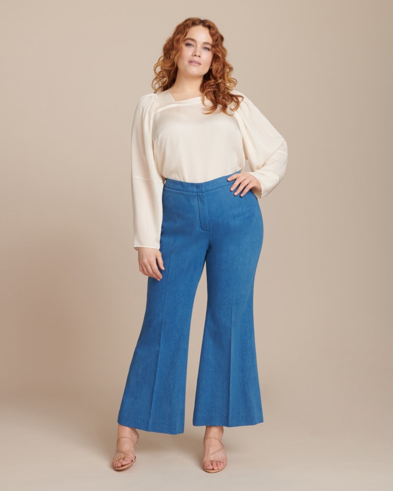 Front of a model wearing a size IT 48 Ankle Flare Trouser in Light Indigo by Derek Lam. | dia_product_style_image_id:226370